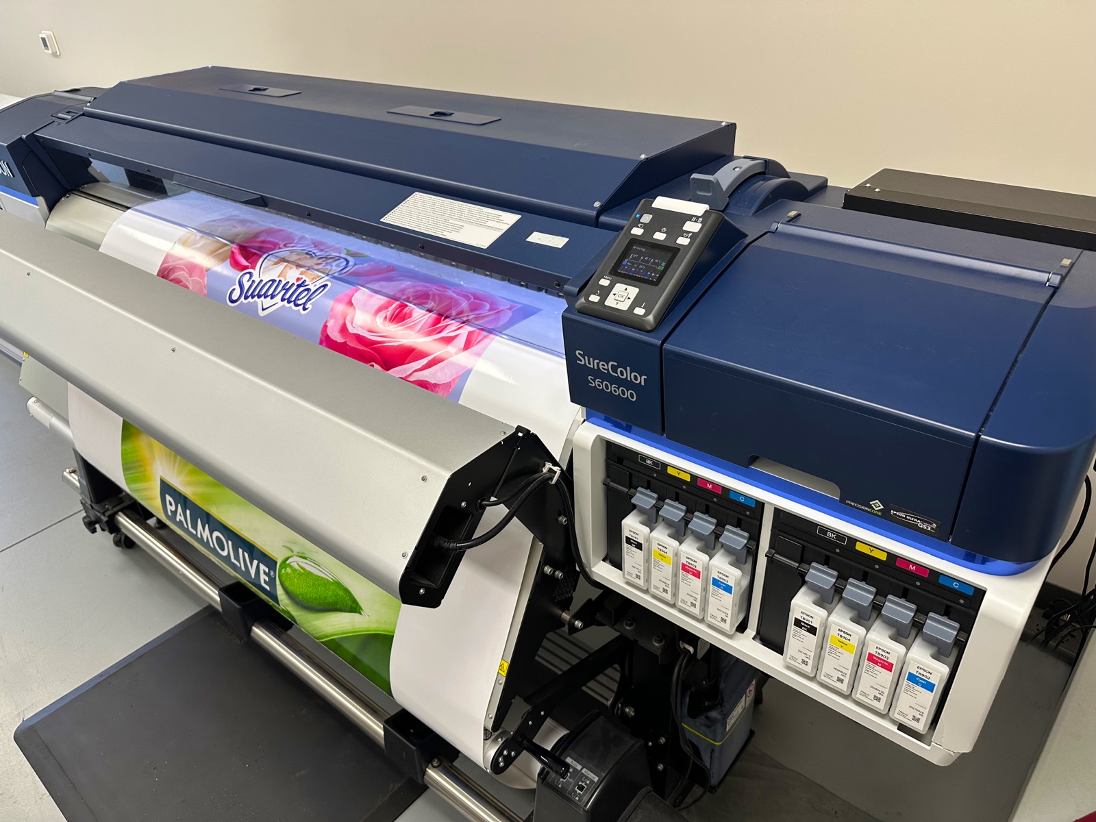 Epson SureColor large-format printer producing Suavitel and Palmolive retail graphics in HAP's in-house print shop